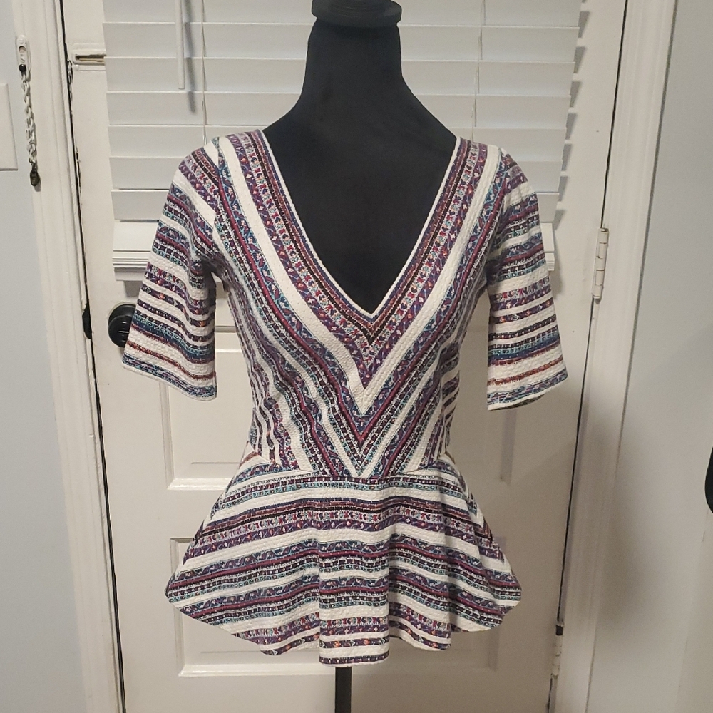 Deletta Striped V-Neck Peplum Top